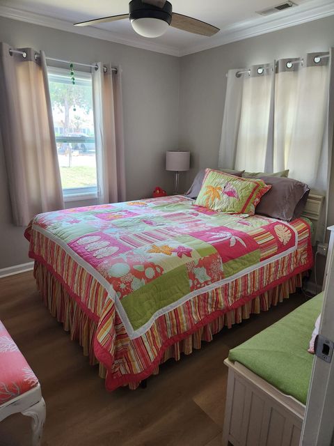 Bedroom three with a queen bed